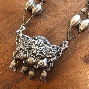 Silver tone antique chinese bat or moth  and silver wire beads necklace